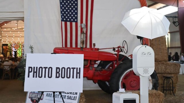 Photo booth with tractor and American flag
