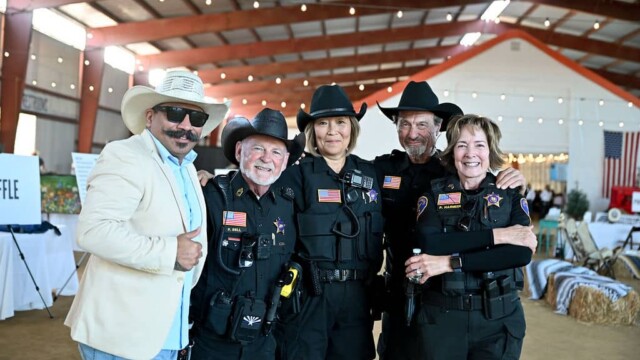 Hope For Little Hearts Fundraiser guest and security personnel